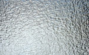 harga kaca es per meter